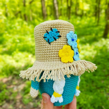 Gnome (girl) in a straw hat