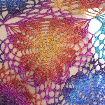 Flower scarf and shawl in one.