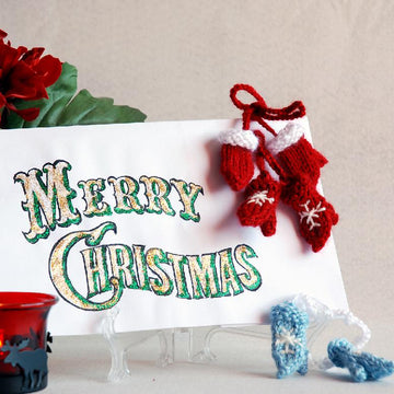 Small mittens for christmas or new year greeting card.