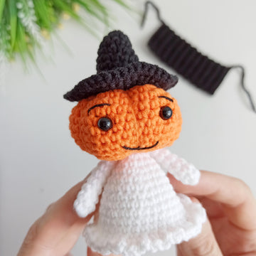 Halloween ghost with a pumpkin head