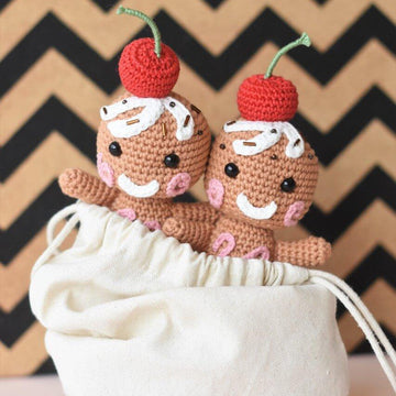 Amigurumi gingerbread with a cherry on top