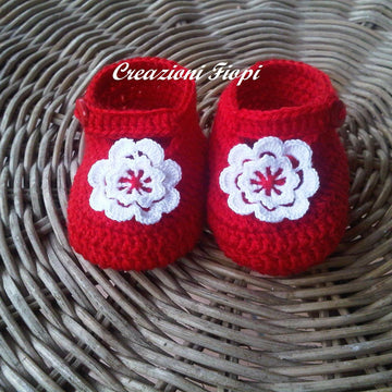 Red baby shoes with flower