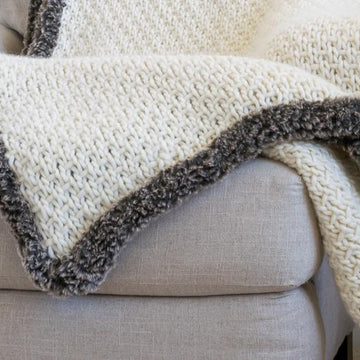 Half-Linen Stitch Knit Blanket with Faux Fur Trim