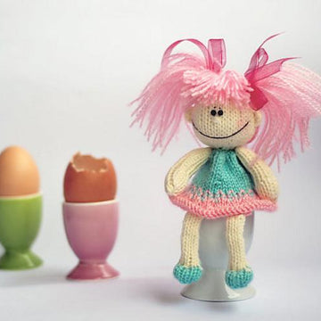 Funny small doll with pink hair for keeping warm breakfast egg