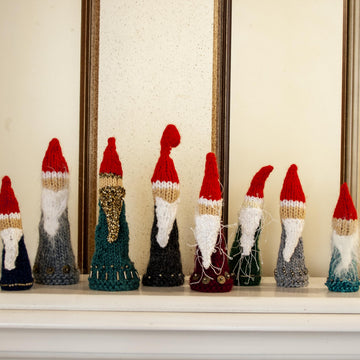 5 Santas  knitting flat