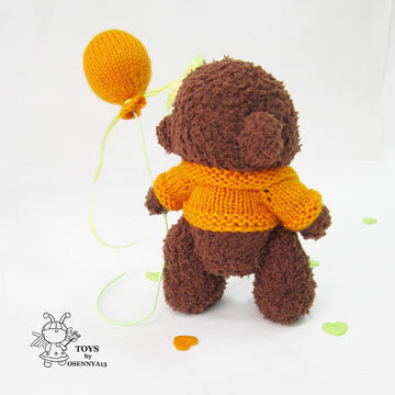 Bear with balloon