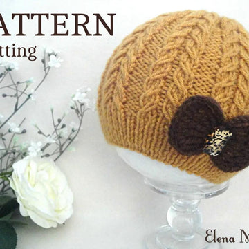 Knitted Baby Girl Hat with Crochet Bow by Elena Mitchell