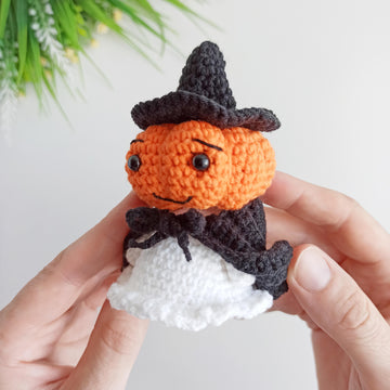 Halloween ghost with a pumpkin head