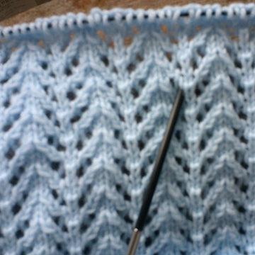 Double knit baby buggy blanket with lace edging