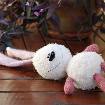 White rabbit with pink ears