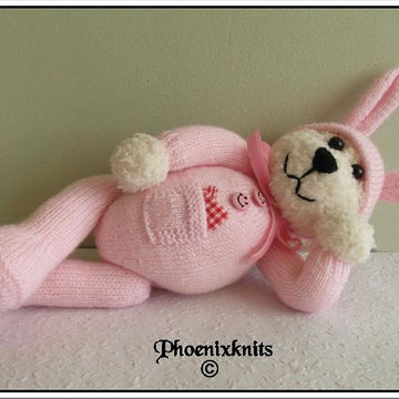 Teddy in a bunny onesie