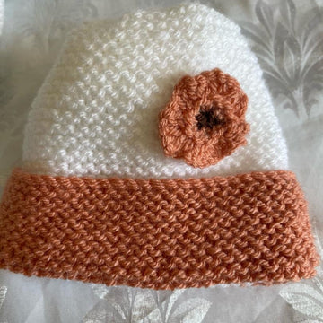 Easy beginner garter stitch flower and pompom baby hat DK knitting pattern