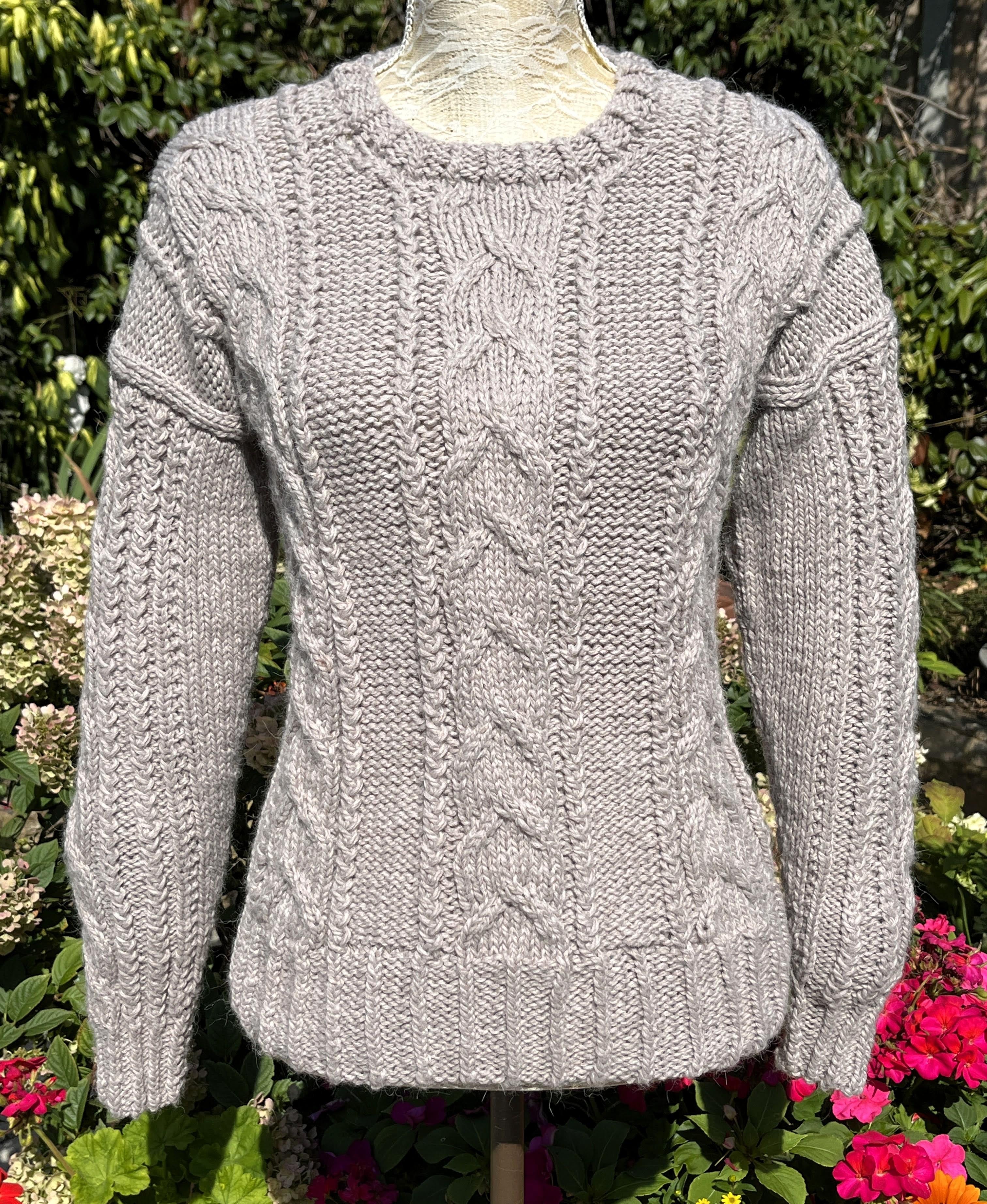 SOFTLY CABLED NEAT FITTING SWEATER