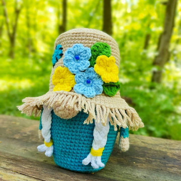 Gnome (girl) in a straw hat