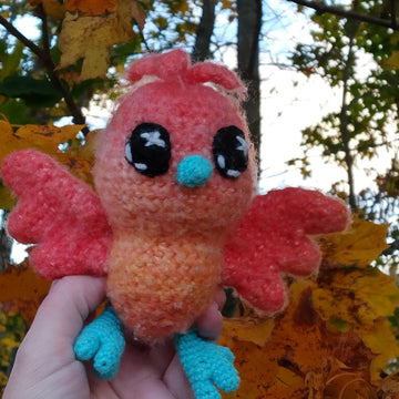 Myth-Born keepers: Nova-Flare, the baby phoenix born in an old chimney, surrounded by a jackdaw family…