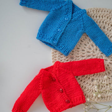 Knitted red cardigan for doll