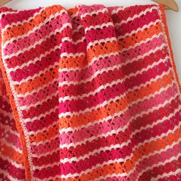 "Simply in red” baby blanket
