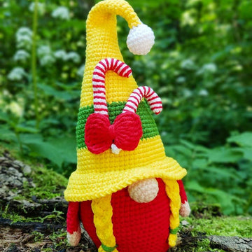 Christmas gnome (girl) with candy canes