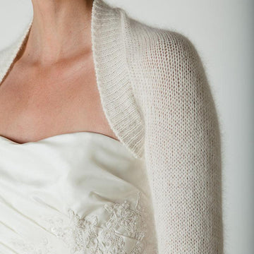 Bolero knitted in one piece