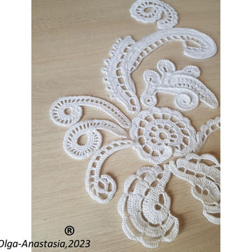 White composition of antique crochet motifs