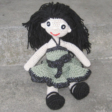 Crochet doll in olive green dress