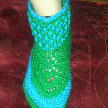 Adult slippers with leather sole