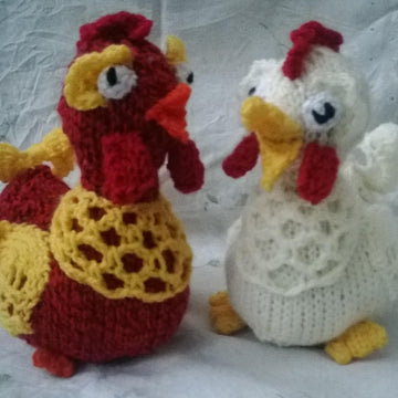 Huhn mit Küken und Ei