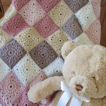 Wrapped in Sunbursts Baby Blanket - Lion Brand Mandala (DK Weight)