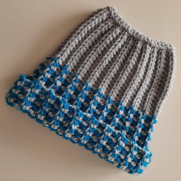 Ribbed stitch ponytail hat
