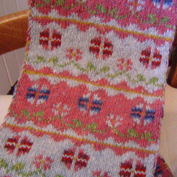 Flowers in winter scarf and hat