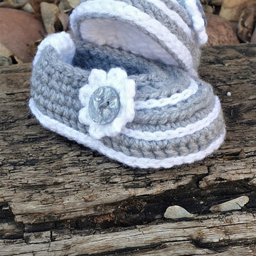 Baby Mary Janes crochet pattern with button detail and surface crochet