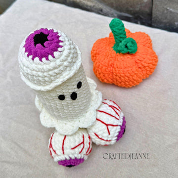 Cheeky ghost with a lift-off pumpkin hat
