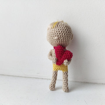 Tiny Cupid with heart