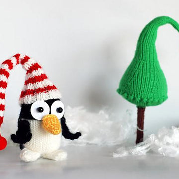 New Year Penguin in hat with Christmas tree