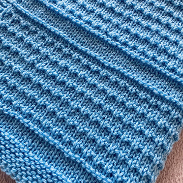 Idris Baby Blanket in Aran or DK