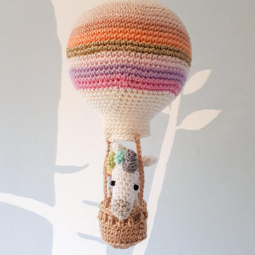 Unicorn in a hot air balloon