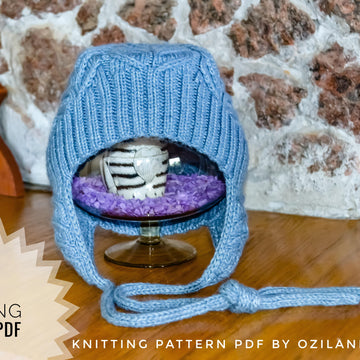 Knitted hat with ear flaps