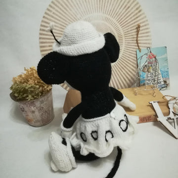 Knitting patterns for Mickey Mouse and Minnie Mouse toys based on Steamboat Willi