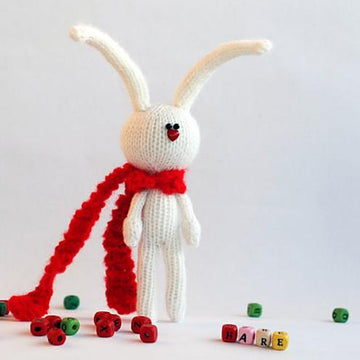 White rabbit in the red scarf and White cat in the dark green scarf
