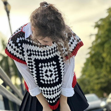 Black and white vest
