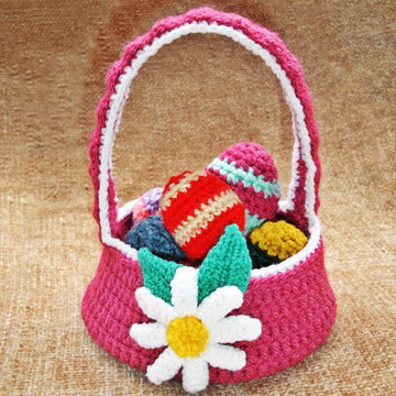 Easter flower basket and coloured easter eggs