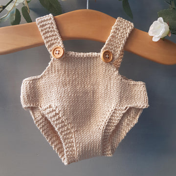 Knitted dolls romper