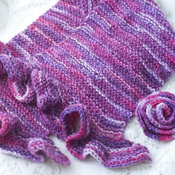 Ruffle Edged Scarf with Flower Scarf Pin