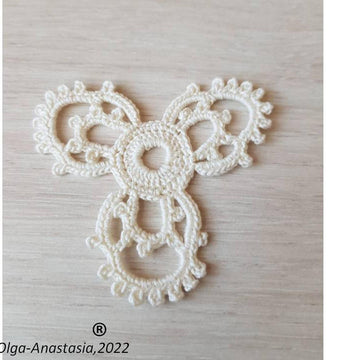 Openwork triangular crochet motif