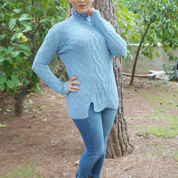 Ruffled neck cabled sweater