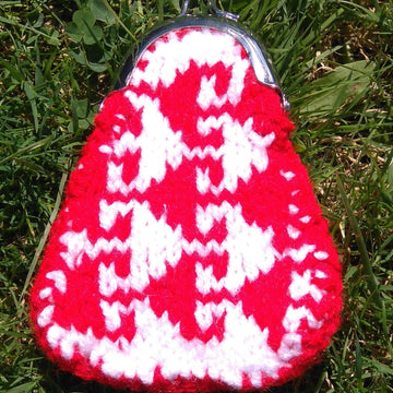 Six knitted coin purses
