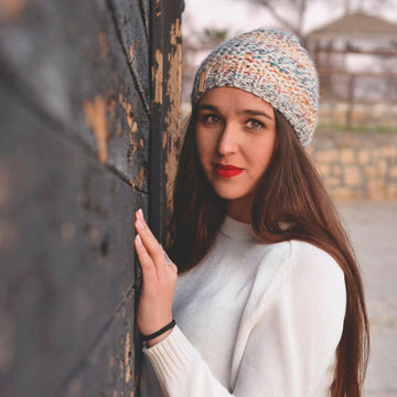 Natashka chunky knit hat with dreadlock pom