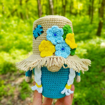 Gnome (girl) in a straw hat