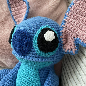 Blue alien amigurumi doll