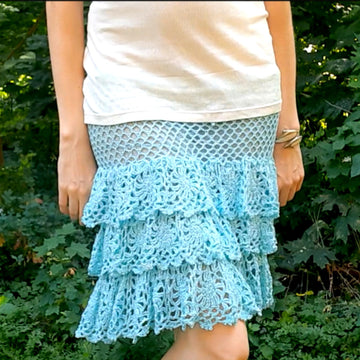 Crochet pin-up lacy ruffled skirt with mesh details.